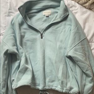 turquoise quarter zip